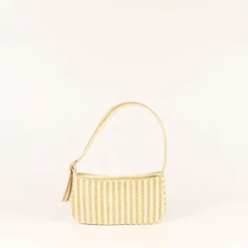 Product Description: GAIA – Organic Textured Jute Baguette Made out of artisanal handicraft jute fabric, this baguette is sturdy, simple yet has an earthy finish to it. Cotton lining inside, with adjustable straps by 3 knots. Color: Cream and Beige Stripes Length: 5.5 inches Width: 10 inches Height: 4 inches Price: ₹900/-