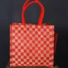 GLEN - jute mini shopping bag with bottle holder. Color: Red and Brown Length: 12 inches Width: 12 inches Height: 8 inches Price: ₹600