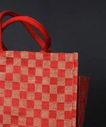 GLEN - jute mini shopping bag with bottle holder. Color: Red and Brown Length: 12 inches Width: 12 inches Height: 8 inches Price: ₹600