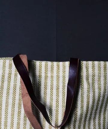 Product Description: HEATHER Jute Mini Tote Bag Color: Cream and green Length: 12 inches Width: 15 inches Height: 5.5 inches Price: ₹700/-