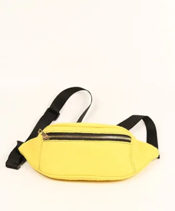 Vibrant yellow fanny pack with multiple compartments and adjustable straps. Color: Yellow Length: 5.5 inches Width: 10 inches Height: 4 inches Price: ₹800/-